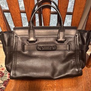 Vintage coach bag in black. Fair condition lots of life left.